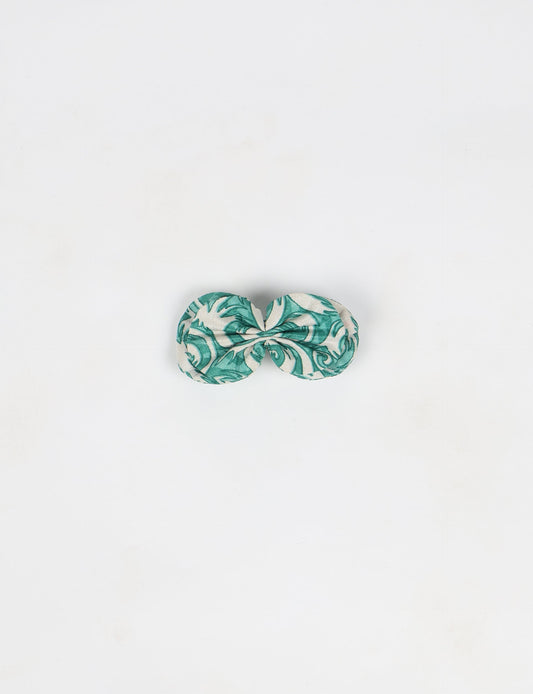 Stylish upcycled women's hairclip made from eco friendly products, reflecting the essence of upcycling fashion, ethical clothing, and sustainable apparel—ideal for those embracing slow fashion and earth friendly clothing.