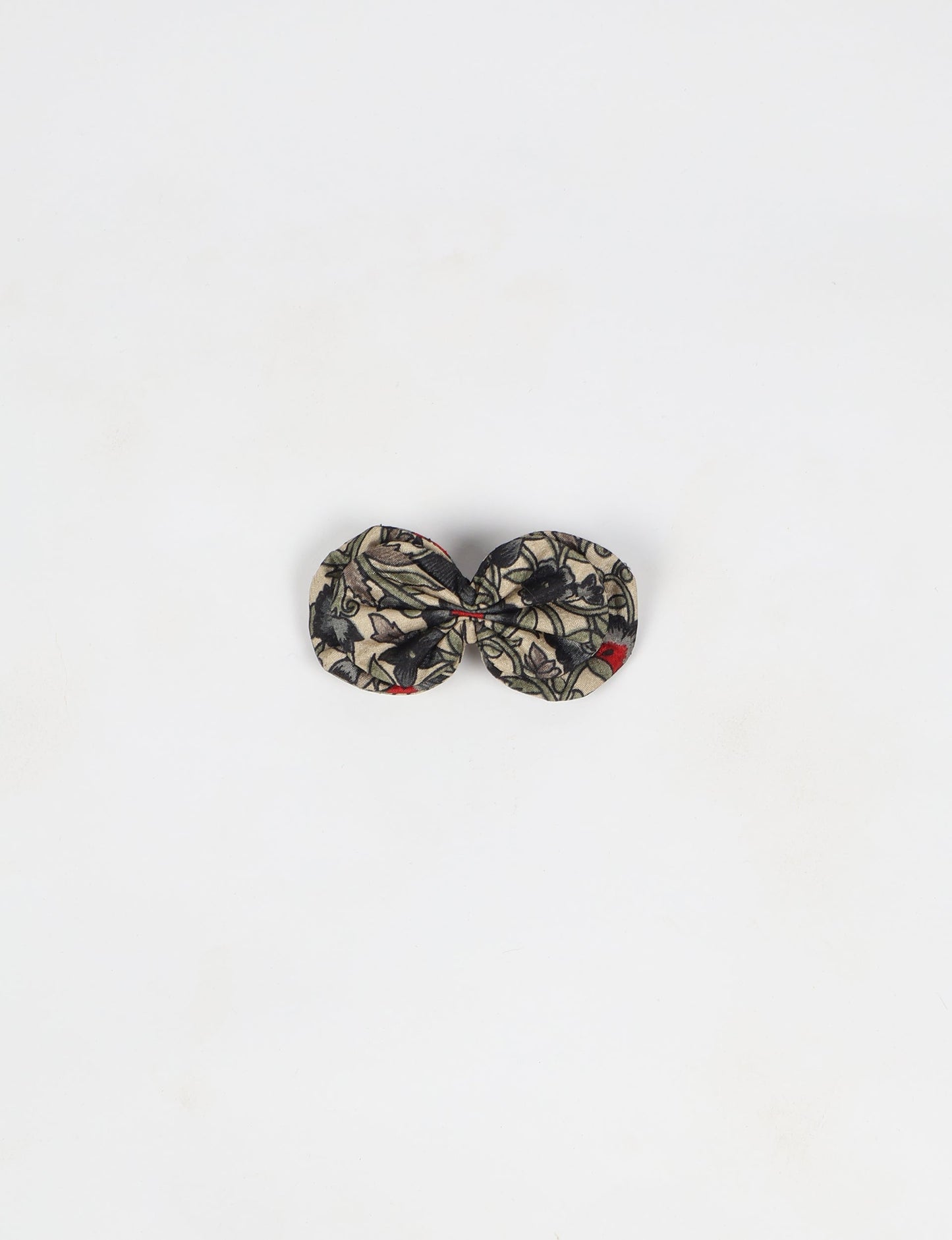 Stylish upcycled women's hairclip made from eco friendly products, reflecting the essence of upcycling fashion, ethical clothing, and sustainable apparel—ideal for those embracing slow fashion and earth friendly clothing.