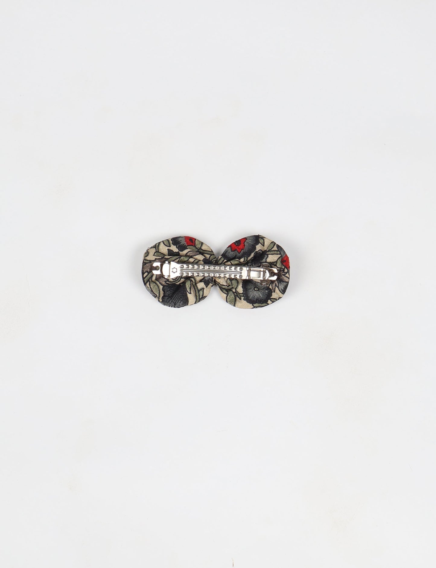 Stylish upcycled women's hairclip made from eco friendly products, reflecting the essence of upcycling fashion, ethical clothing, and sustainable apparel—ideal for those embracing slow fashion and earth friendly clothing.