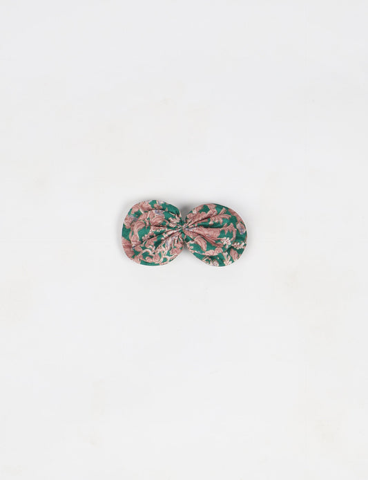 Stylish upcycled women's hairclip made from eco friendly products, reflecting the essence of upcycling fashion, ethical clothing, and sustainable apparel—ideal for those embracing slow fashion and earth friendly clothing.