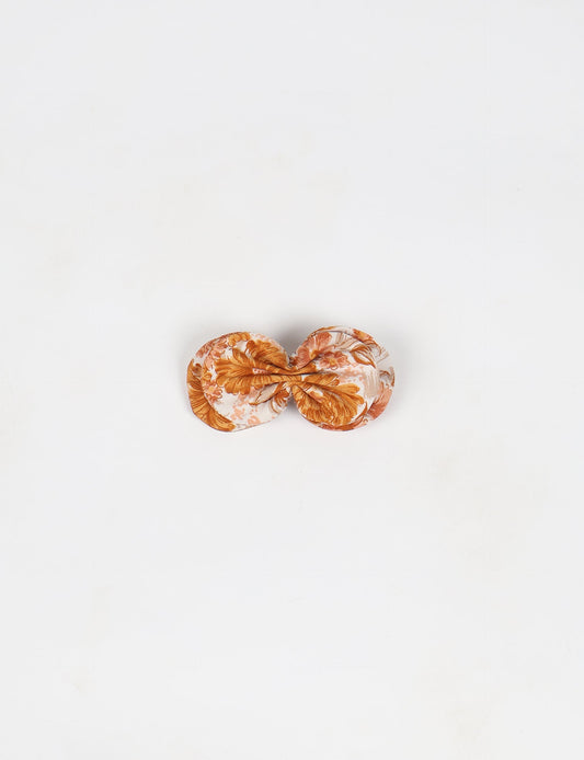 Stylish upcycled women's hairclip made from eco friendly products, reflecting the essence of upcycling fashion, ethical clothing, and sustainable apparel—ideal for those embracing slow fashion and earth friendly clothing.