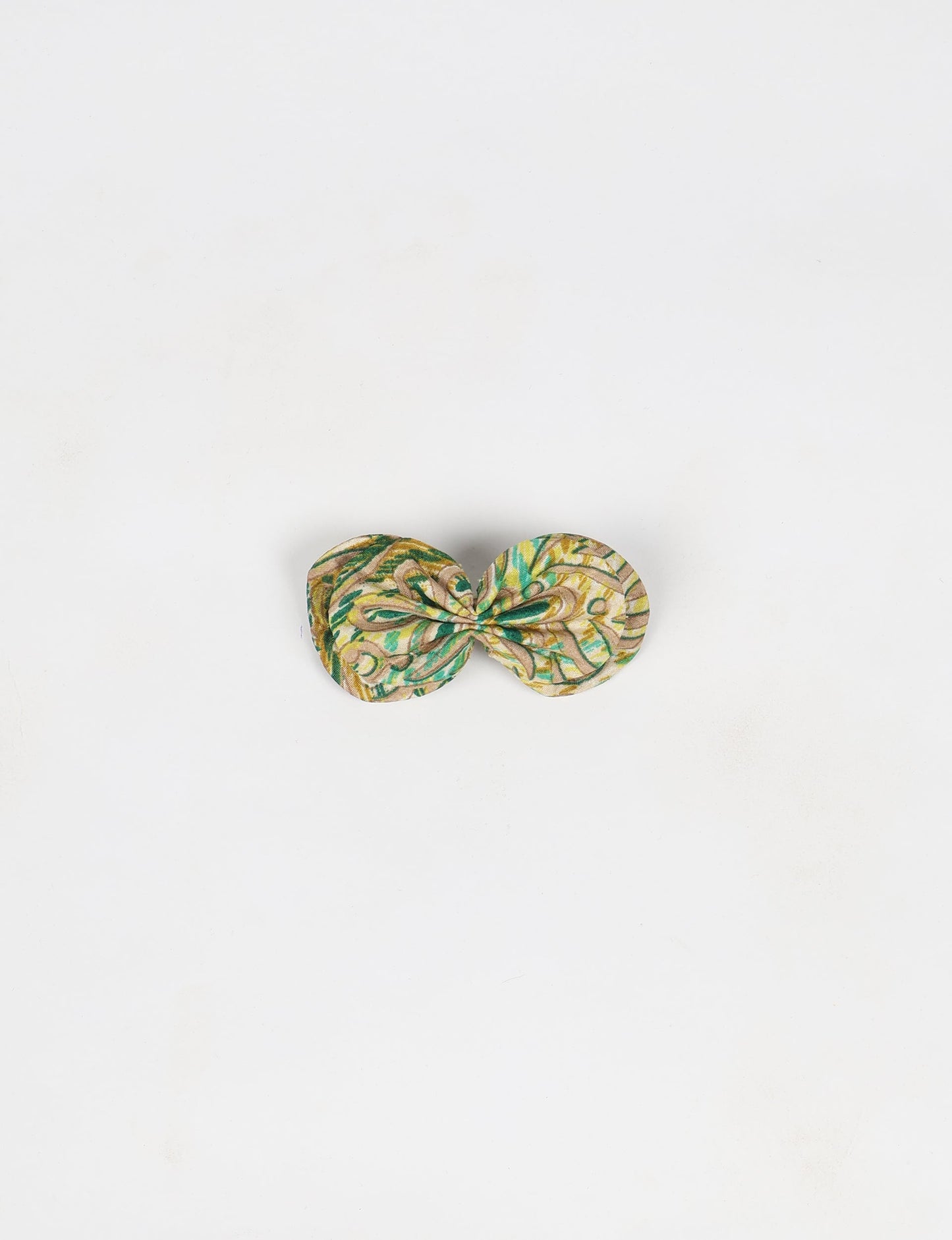 Stylish upcycled women's hairclip made from eco friendly products, reflecting the essence of upcycling fashion, ethical clothing, and sustainable apparel—ideal for those embracing slow fashion and earth friendly clothing.