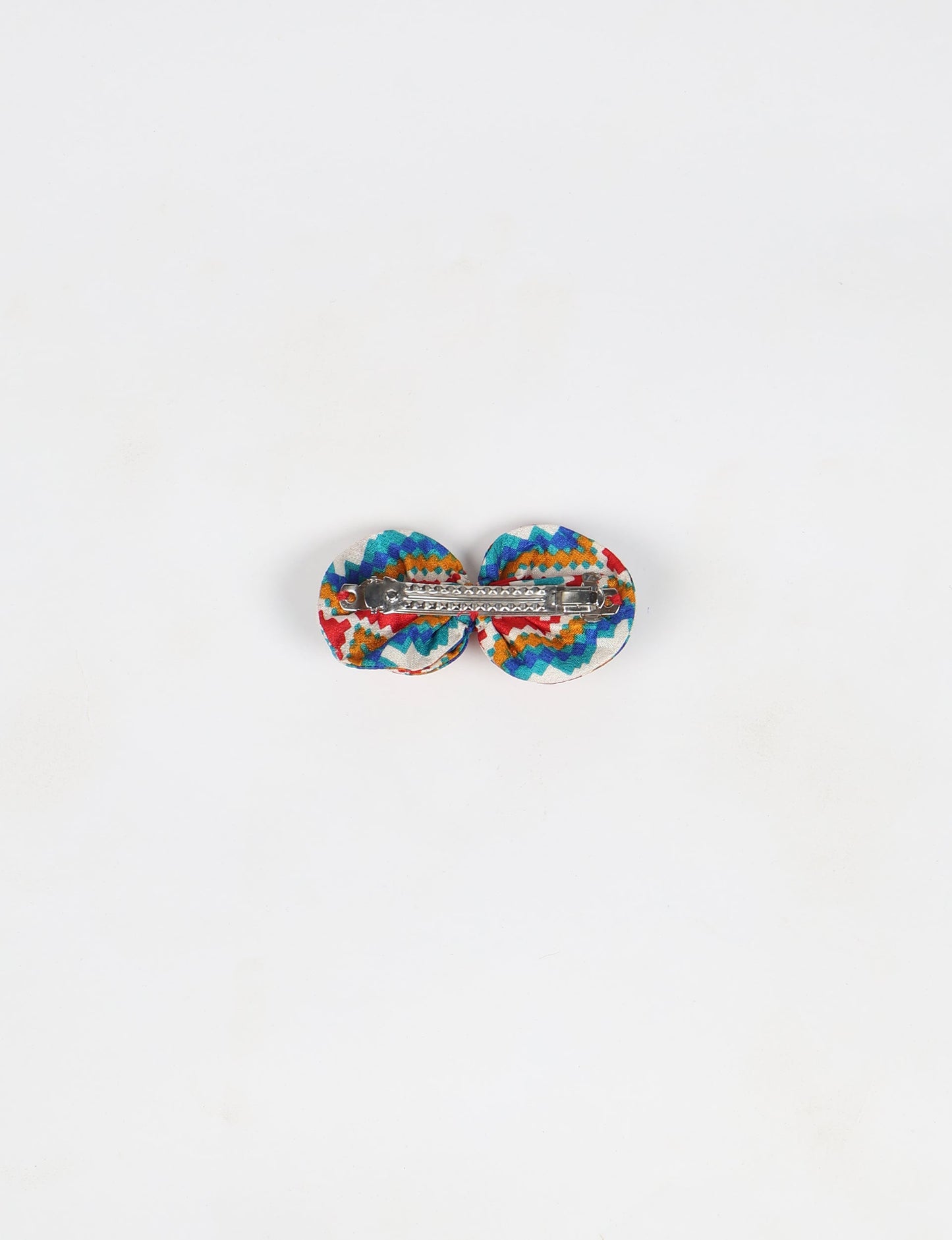 Stylish upcycled women's hairclip made from eco friendly products, reflecting the essence of upcycling fashion, ethical clothing, and sustainable apparel—ideal for those embracing slow fashion and earth friendly clothing.