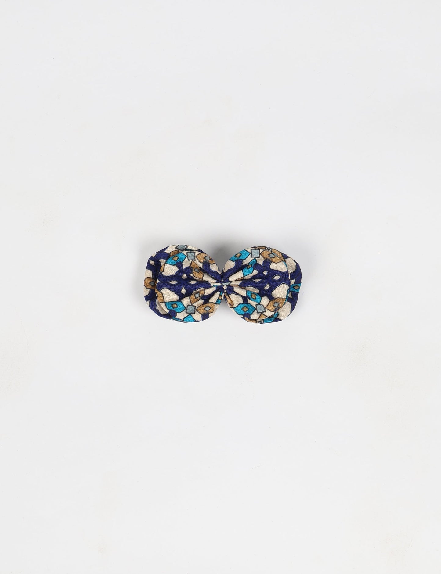 Stylish upcycled women's hairclip made from eco friendly products, reflecting the essence of upcycling fashion, ethical clothing, and sustainable apparel—ideal for those embracing slow fashion and earth friendly clothing.