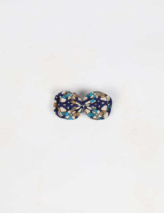 Stylish upcycled women's hairclip made from eco friendly products, reflecting the essence of upcycling fashion, ethical clothing, and sustainable apparel—ideal for those embracing slow fashion and earth friendly clothing.