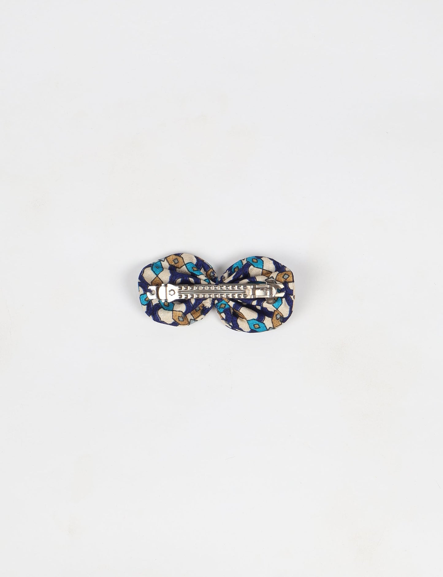 Stylish upcycled women's hairclip made from eco friendly products, reflecting the essence of upcycling fashion, ethical clothing, and sustainable apparel—ideal for those embracing slow fashion and earth friendly clothing.