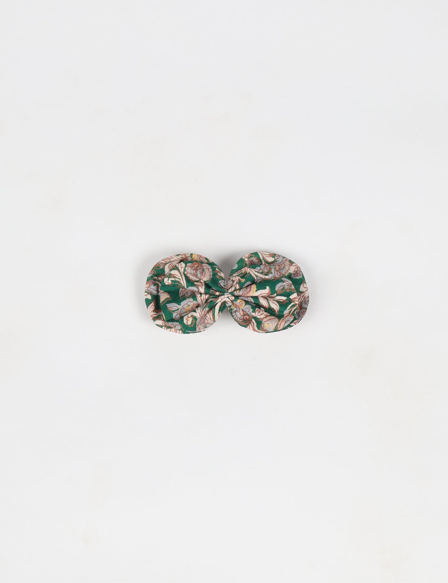 Stylish upcycled women's hairclip made from eco friendly products, reflecting the essence of upcycling fashion, ethical clothing, and sustainable apparel—ideal for those embracing slow fashion and earth friendly clothing.