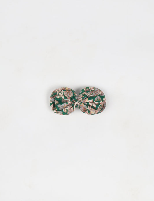 Stylish upcycled women's hairclip made from eco friendly products, reflecting the essence of upcycling fashion, ethical clothing, and sustainable apparel—ideal for those embracing slow fashion and earth friendly clothing.