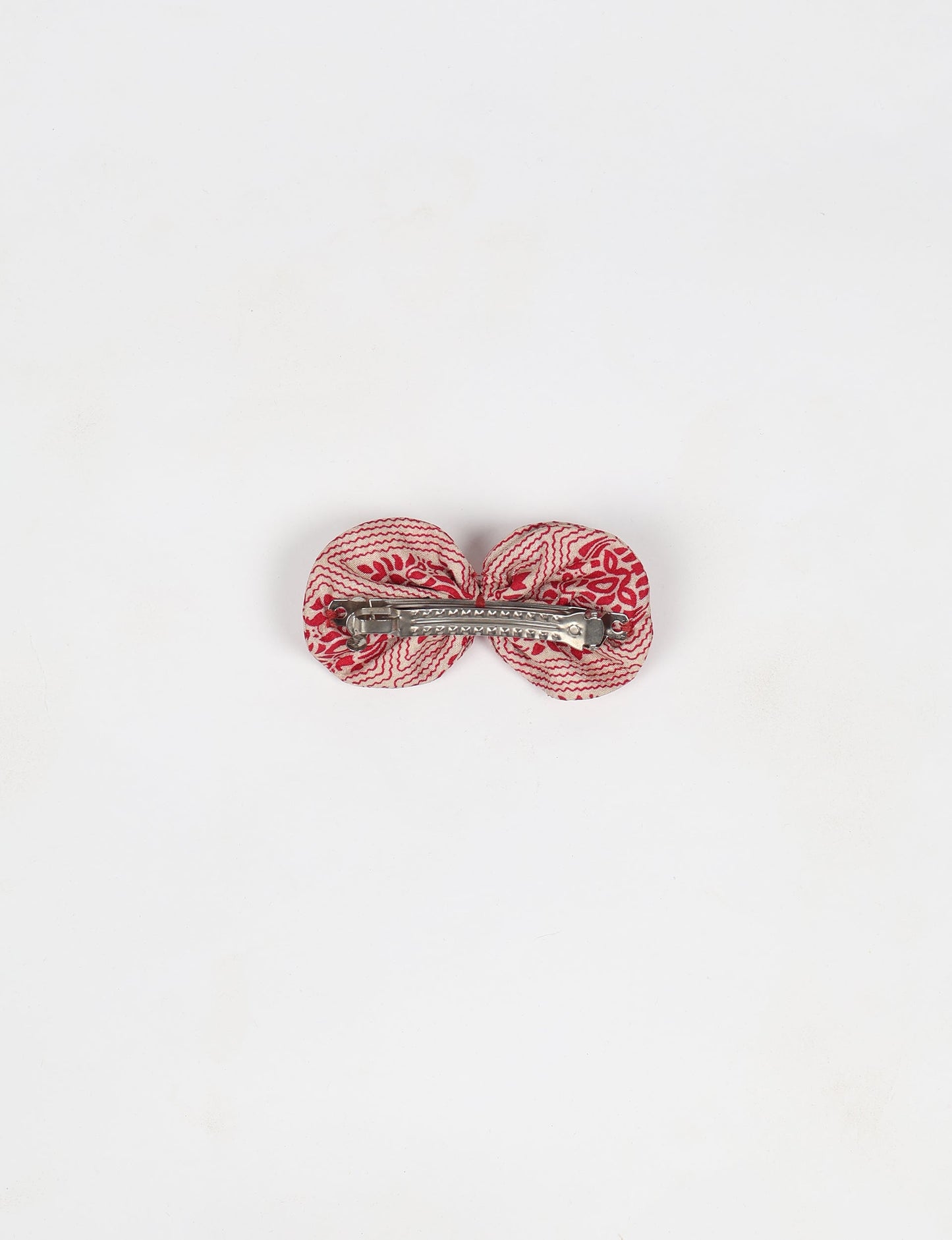 Stylish upcycled women's hairclip made from eco friendly products, reflecting the essence of upcycling fashion, ethical clothing, and sustainable apparel—ideal for those embracing slow fashion and earth friendly clothing.
