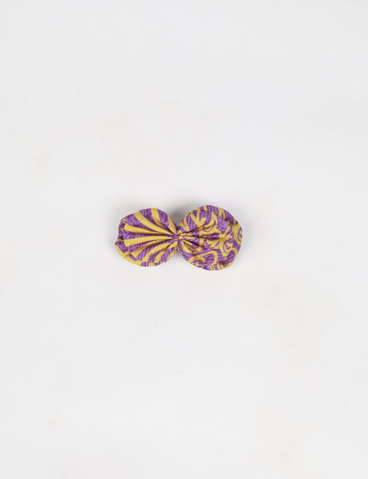 Stylish upcycled women's hairclip made from eco friendly products, reflecting the essence of upcycling fashion, ethical clothing, and sustainable apparel—ideal for those embracing slow fashion and earth friendly clothing.