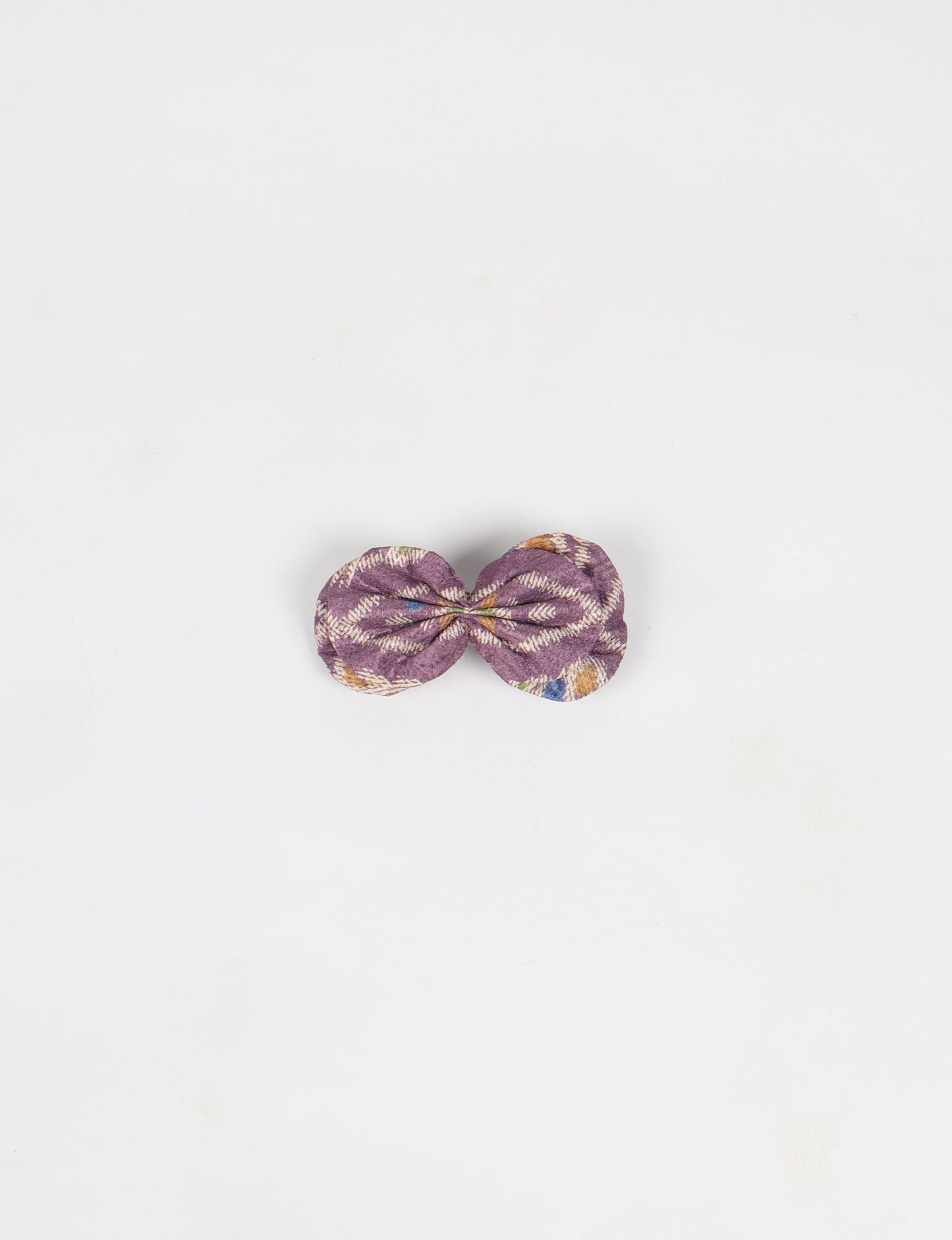 Stylish upcycled women's hairclip made from eco friendly products, reflecting the essence of upcycling fashion, ethical clothing, and sustainable apparel—ideal for those embracing slow fashion and earth friendly clothing.
