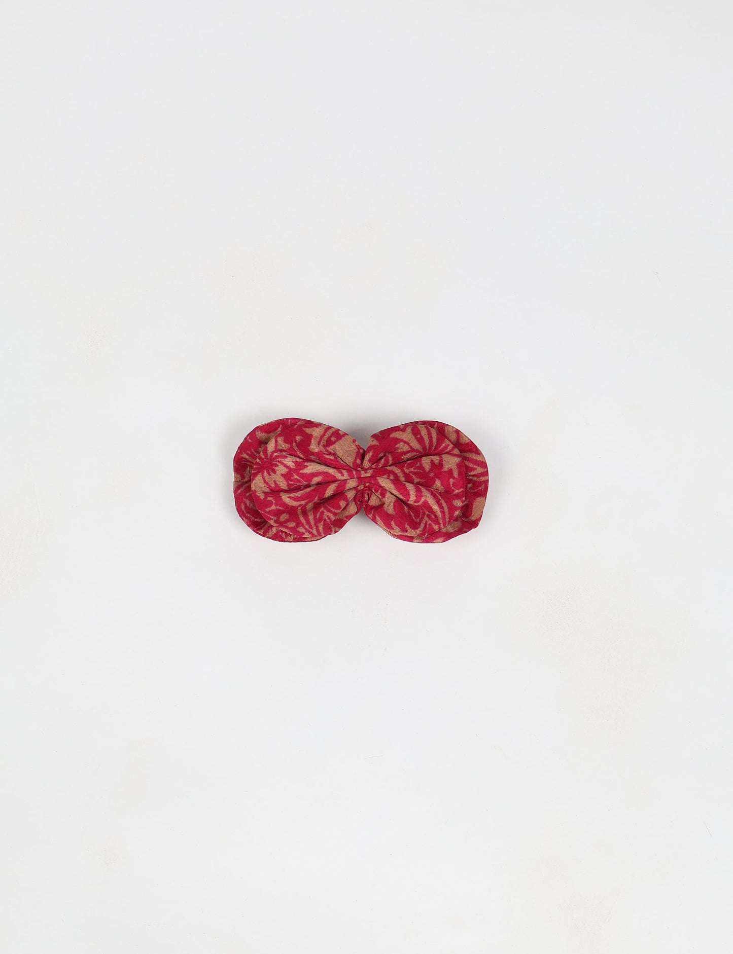 Stylish upcycled women's hairclip made from eco friendly products, reflecting the essence of upcycling fashion, ethical clothing, and sustainable apparel—ideal for those embracing slow fashion and earth friendly clothing.