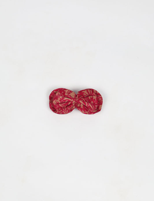 Stylish upcycled women's hairclip made from eco friendly products, reflecting the essence of upcycling fashion, ethical clothing, and sustainable apparel—ideal for those embracing slow fashion and earth friendly clothing.