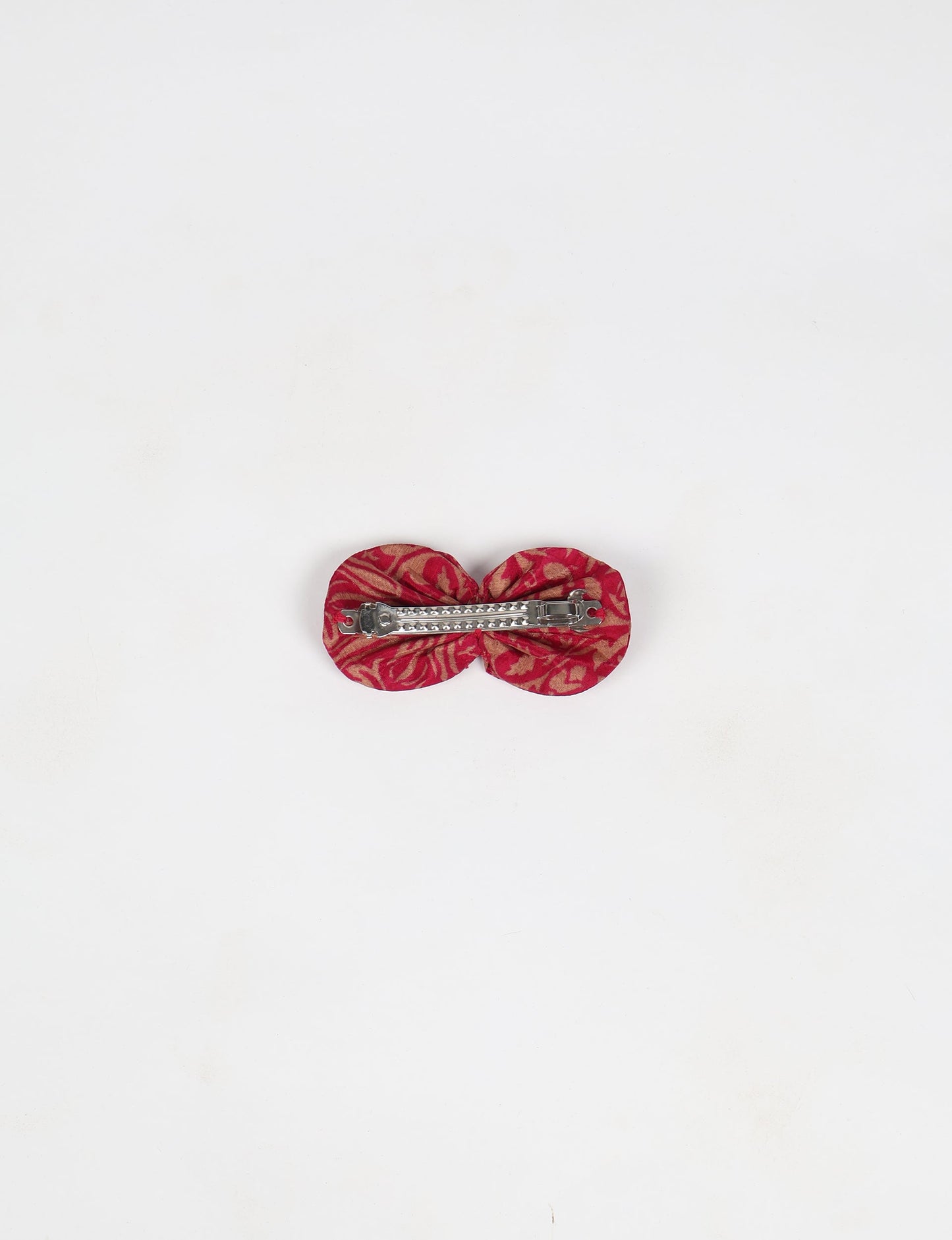 Stylish upcycled women's hairclip made from eco friendly products, reflecting the essence of upcycling fashion, ethical clothing, and sustainable apparel—ideal for those embracing slow fashion and earth friendly clothing.