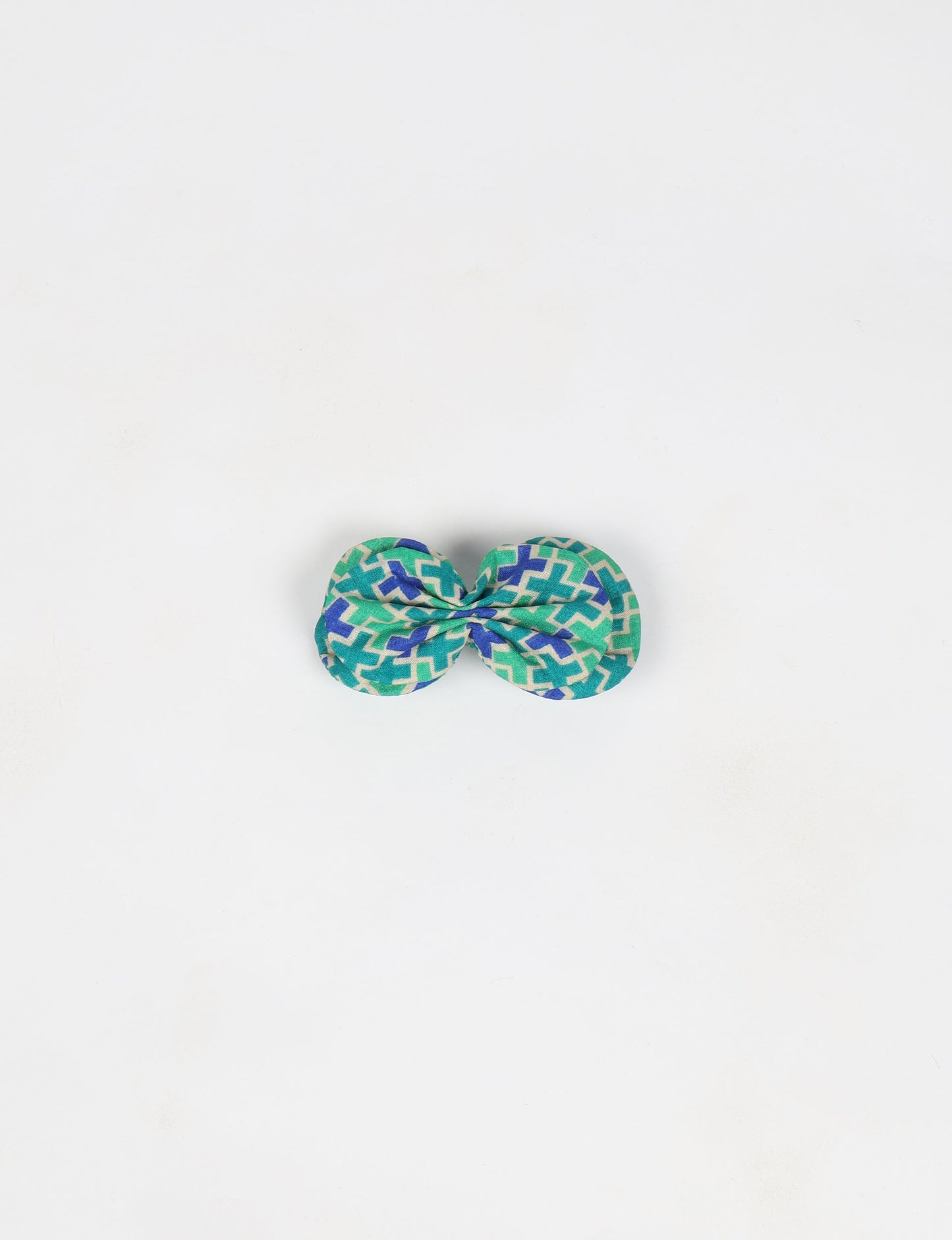Stylish upcycled women's hairclip made from eco friendly products, reflecting the essence of upcycling fashion, ethical clothing, and sustainable apparel—ideal for those embracing slow fashion and earth friendly clothing.