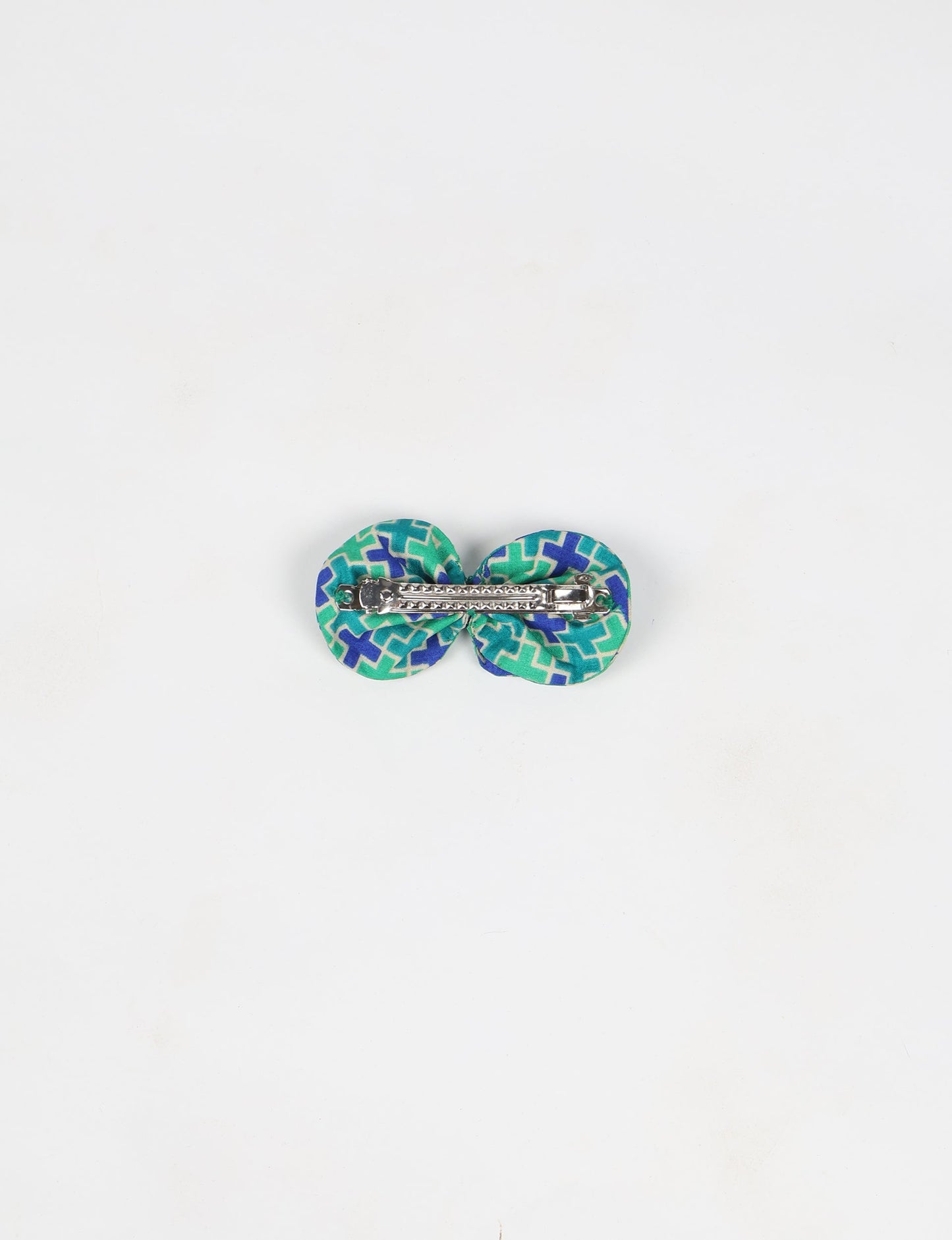Stylish upcycled women's hairclip made from eco friendly products, reflecting the essence of upcycling fashion, ethical clothing, and sustainable apparel—ideal for those embracing slow fashion and earth friendly clothing.