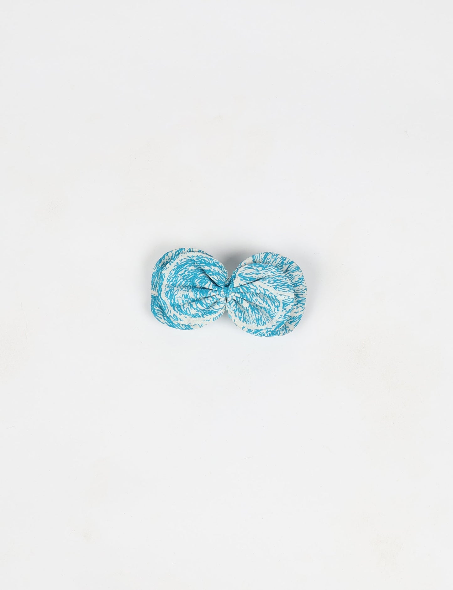 Stylish upcycled women's hairclip made from eco friendly products, reflecting the essence of upcycling fashion, ethical clothing, and sustainable apparel—ideal for those embracing slow fashion and earth friendly clothing.