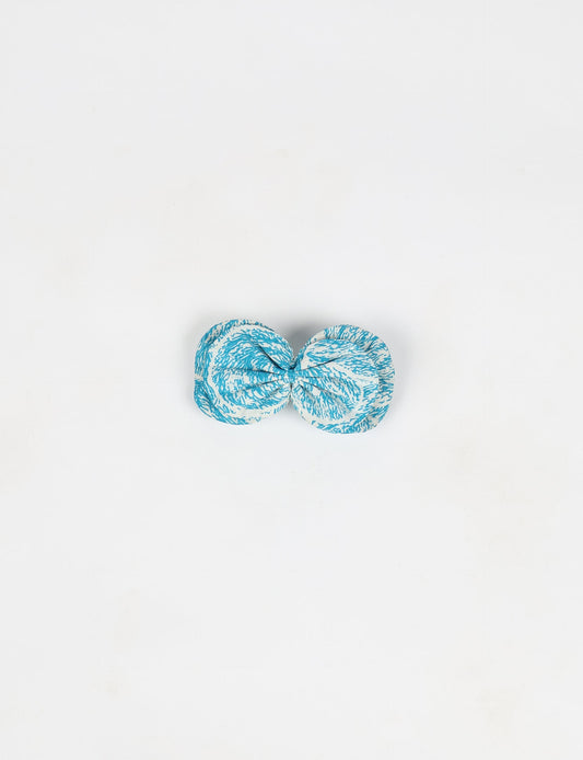 Stylish upcycled women's hairclip made from eco friendly products, reflecting the essence of upcycling fashion, ethical clothing, and sustainable apparel—ideal for those embracing slow fashion and earth friendly clothing.