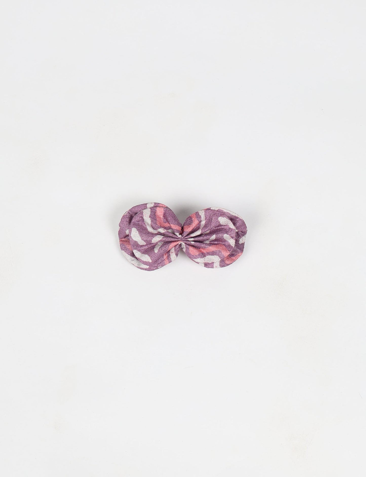 Stylish upcycled women's hairclip made from eco friendly products, reflecting the essence of upcycling fashion, ethical clothing, and sustainable apparel—ideal for those embracing slow fashion and earth friendly clothing.