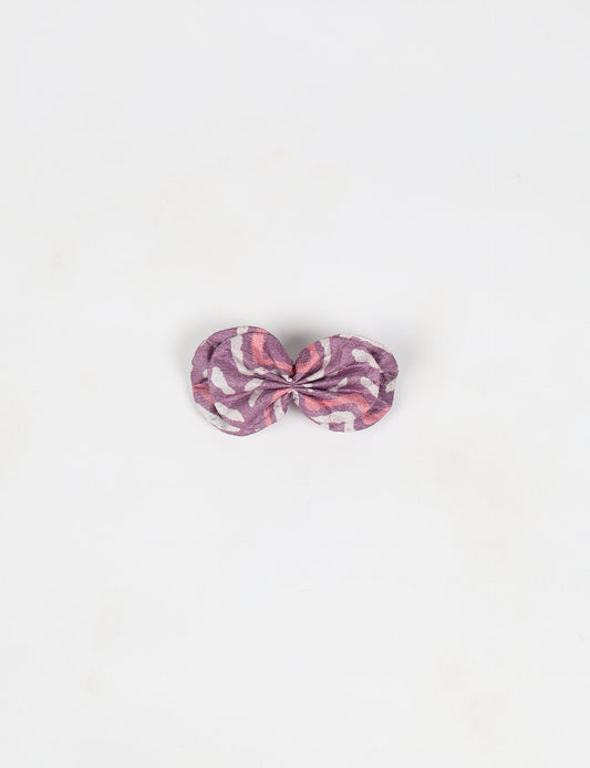 Stylish upcycled women's hairclip made from eco friendly products, reflecting the essence of upcycling fashion, ethical clothing, and sustainable apparel—ideal for those embracing slow fashion and earth friendly clothing.