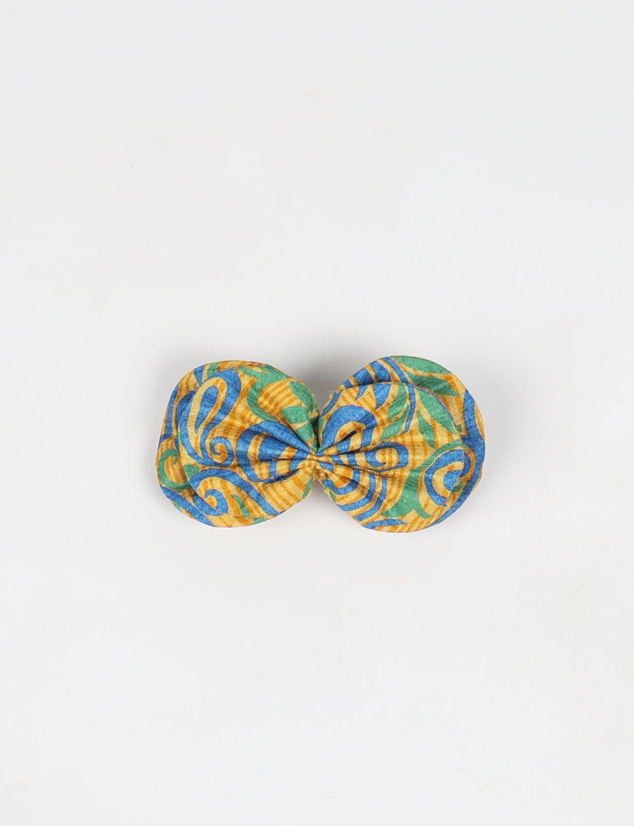 Stylish upcycled women's hairclip made from eco friendly products, reflecting the essence of upcycling fashion, ethical clothing, and sustainable apparel—ideal for those embracing slow fashion and earth friendly clothing.