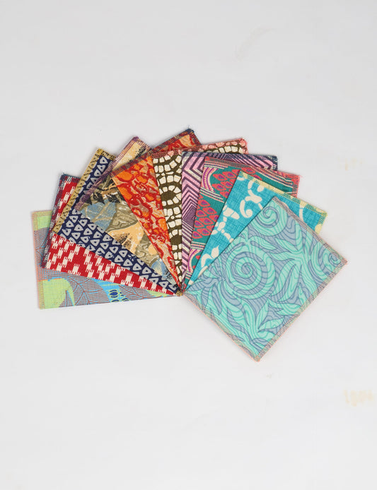 Sustainably crafted FOLDED POSTCARD SET, 10 assorted pieces made with 100% recycled paper and printed sari fabric sourced from Mumbai markets. Eco-friendly with contrast overlock edging. Envelopes included for eco-conscious gratitude and cheerful messages to loved ones.