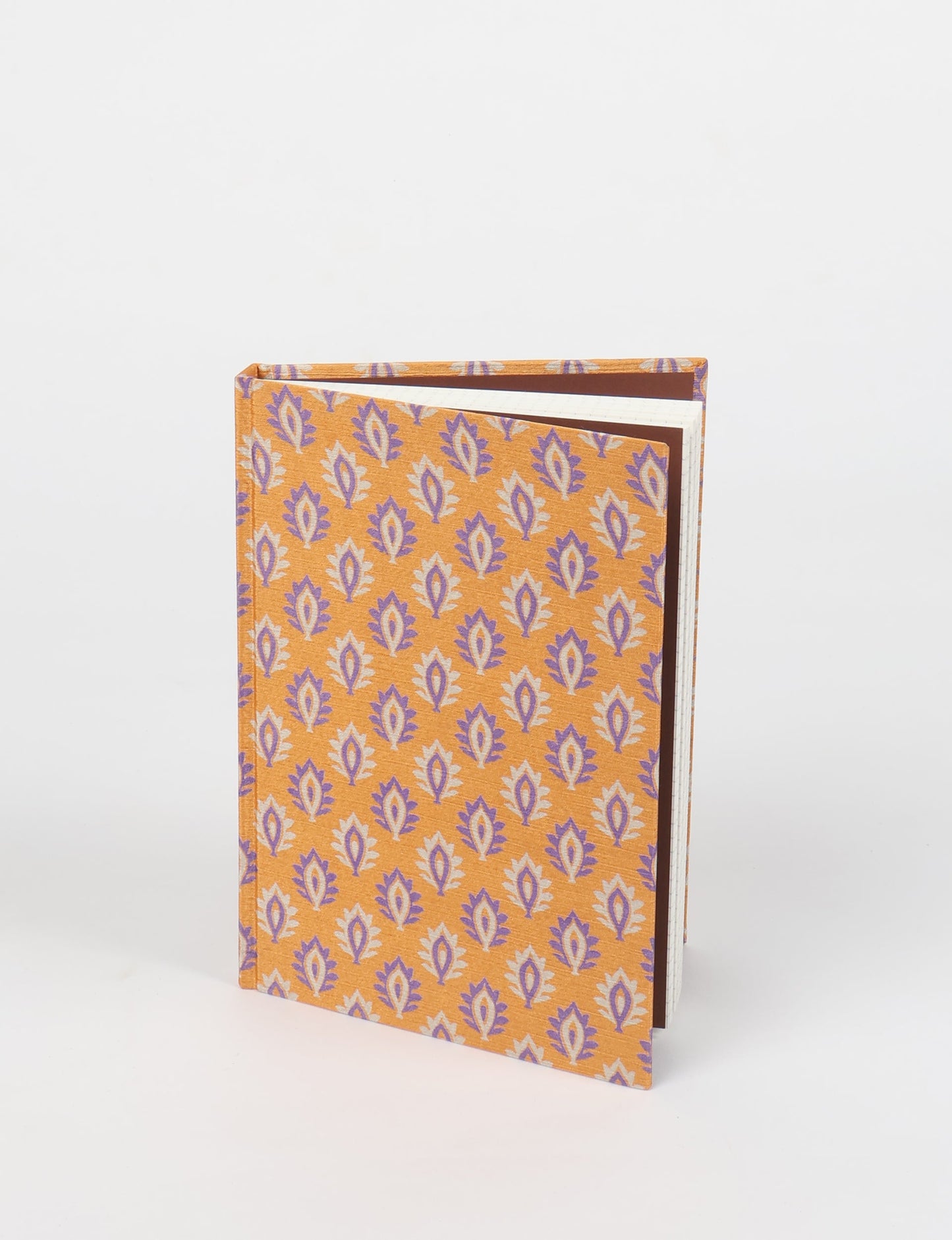 Elevate your scribbling experience with our A5 hardcover notebook, an epitome of green fashion. Sustainable and upcycled, this notebook features recycled fabric covers and aligns with the ethos of circular fashion. Dive into conscious living with our eco-friendly, recycled material notebook.