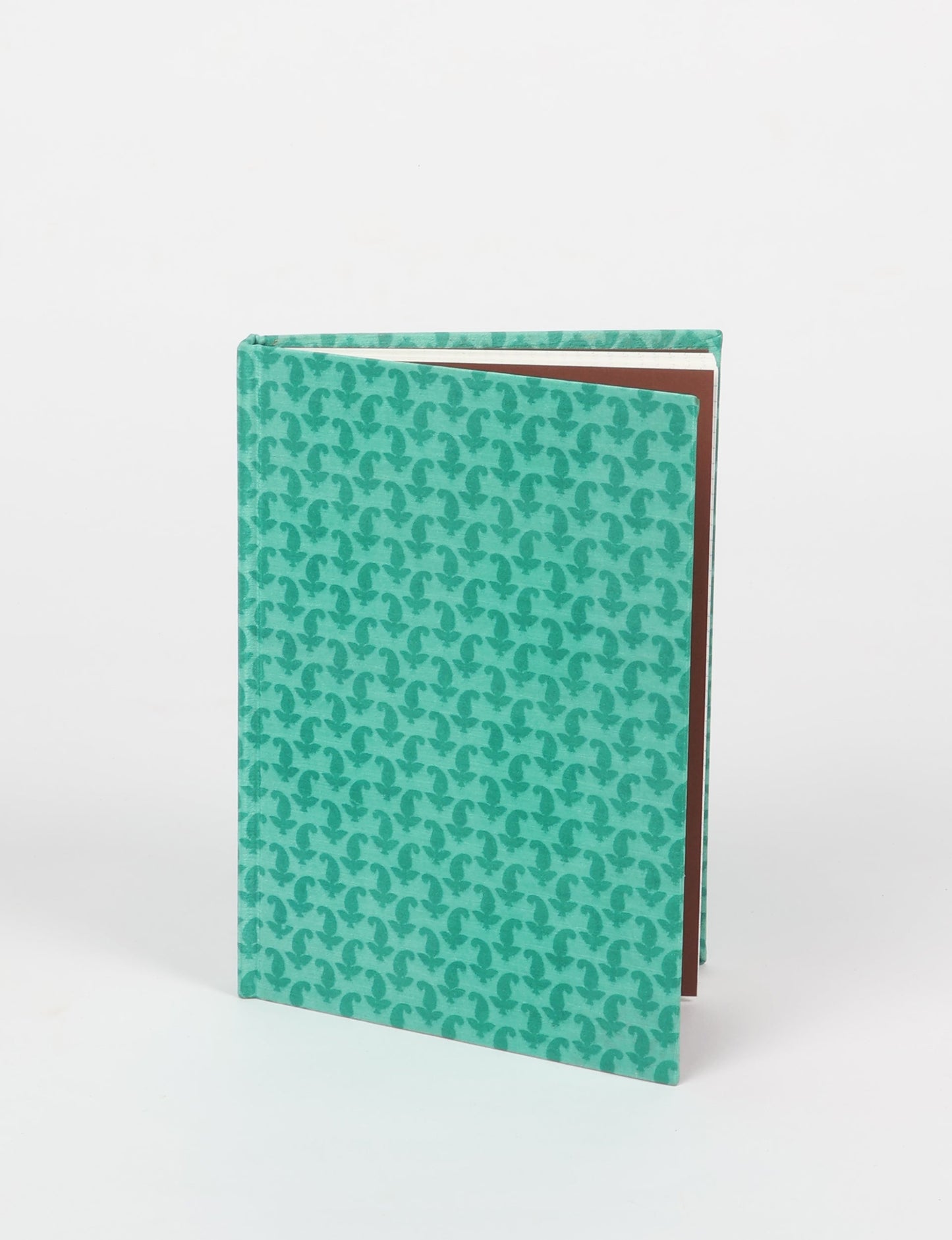 Elevate your scribbling experience with our A5 hardcover notebook, an epitome of green fashion. Sustainable and upcycled, this notebook features recycled fabric covers and aligns with the ethos of circular fashion. Dive into conscious living with our eco-friendly, recycled material notebook.