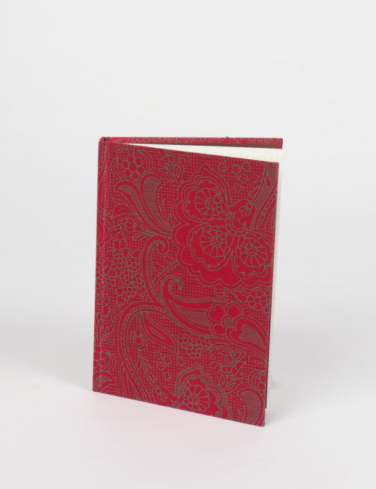 Elevate your scribbling experience with our A5 hardcover notebook, an epitome of green fashion. Sustainable and upcycled, this notebook features recycled fabric covers and aligns with the ethos of circular fashion. Dive into conscious living with our eco-friendly, recycled material notebook.