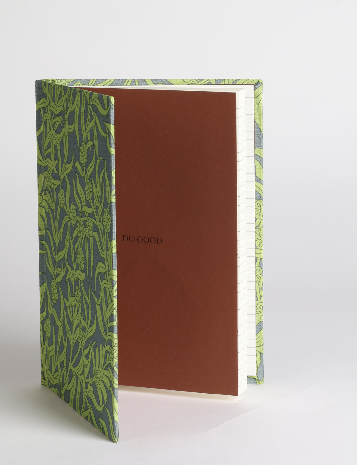 A5 hard cover notebook featuring the DO GOOD message, durable hardbound cover, ruled inner pages, printed endpapers and a lay-flat design.