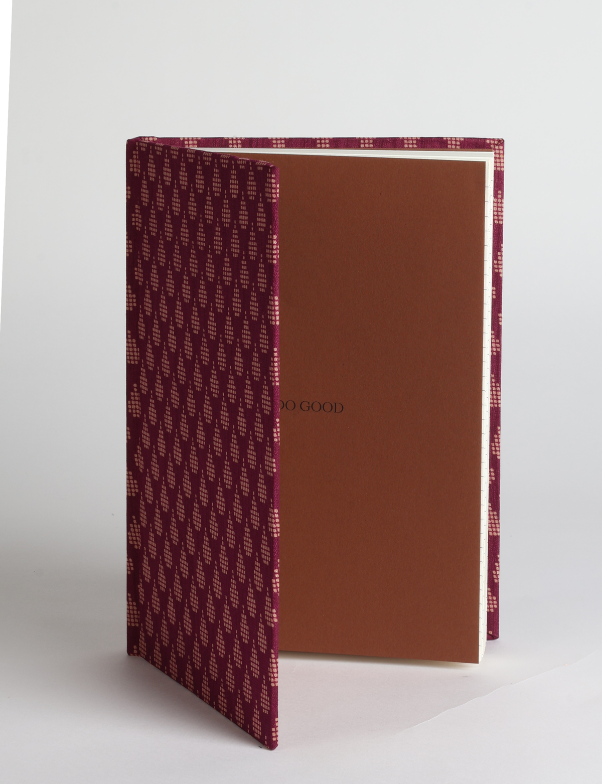 A5 hard cover notebook featuring the DO GOOD message, durable hardbound cover, ruled inner pages, printed endpapers and a lay-flat design.