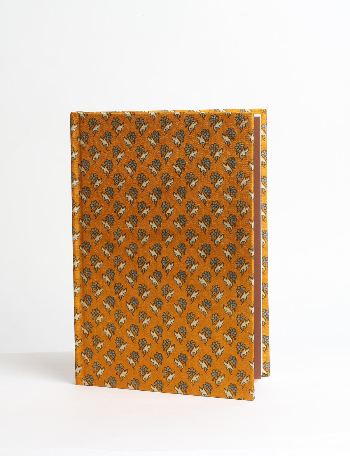 A5 hard cover notebook featuring the DO GOOD message, durable hardbound cover, ruled inner pages, printed endpapers and a lay-flat design.