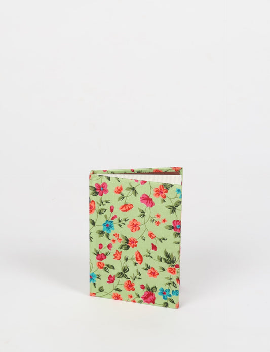 Indulge your creative spirit with our A6 hardcover notebook – a blend of sustainability and style. Made with 100% recycled paper and adorned with pre-loved sari fabric, this eco-conscious notebook encourages mindful note-taking and resonates with the principles of eco-friendly fashion.