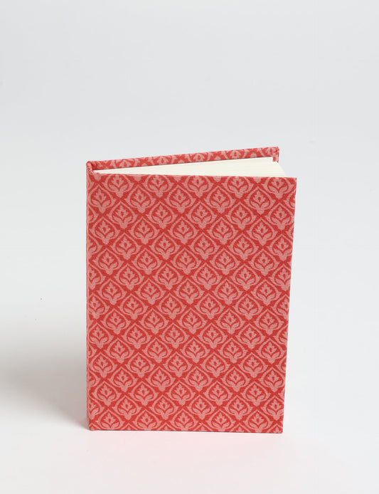 Indulge your creative spirit with our A6 hardcover notebook – a blend of sustainability and style. Made with 100% recycled paper and adorned with pre-loved sari fabric, this eco-conscious notebook encourages mindful note-taking and resonates with the principles of eco-friendly fashion.