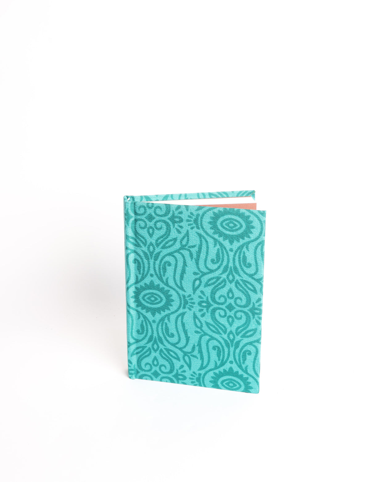 A6 hard cover notebook with teal pre-loved sari fabric cover featuring dark green floral vine pattern, standing upright