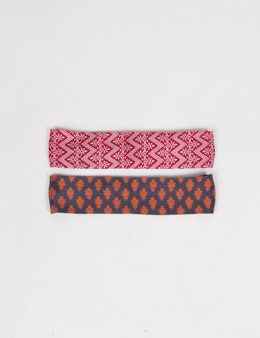 Upcycled sari elastic headband in colorful recycled fabric, handmade with zero waste clothing practices—an example of ethical clothing, fair trade fashion, and eco friendly fashion supporting climate neutral, sustainable women’s clothing.