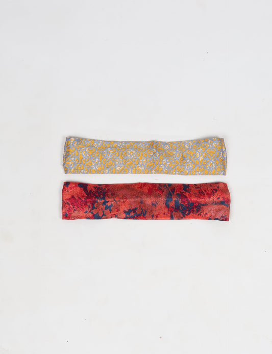 Upcycled sari elastic headband in colorful recycled fabric, handmade with zero waste clothing practices—an example of ethical clothing, fair trade fashion, and eco friendly fashion supporting climate neutral, sustainable women’s clothing.