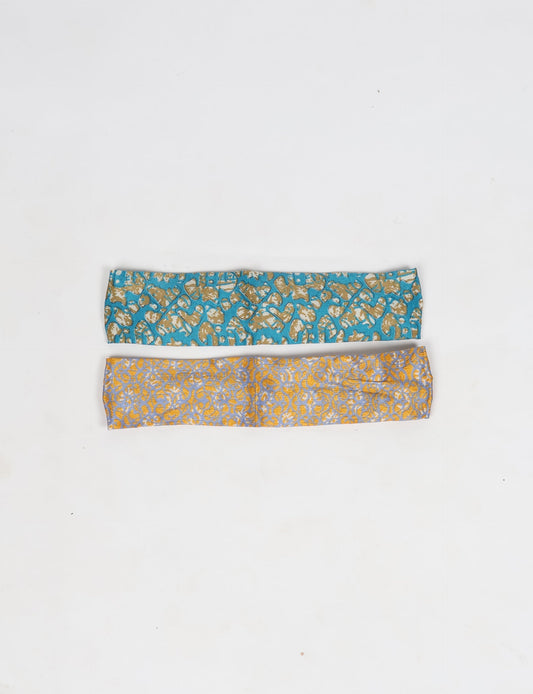 Upcycled sari elastic headband in colorful recycled fabric, handmade with zero waste clothing practices—an example of ethical clothing, fair trade fashion, and eco friendly fashion supporting climate neutral, sustainable women’s clothing.
