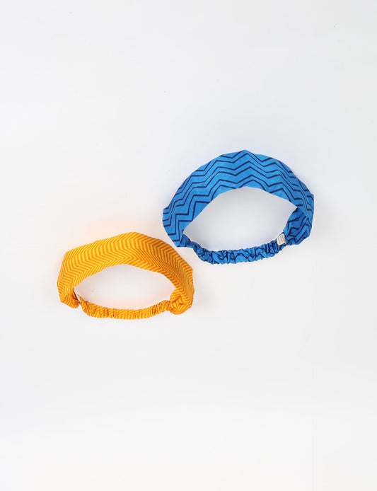 Upcycled sari elastic headband in colorful recycled fabric, handmade with zero waste clothing practices—an example of ethical clothing, fair trade fashion, and eco friendly fashion supporting climate neutral, sustainable women’s clothing.