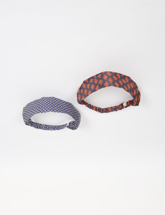 Upcycled sari elastic headband in colorful recycled fabric, handmade with zero waste clothing practices—an example of ethical clothing, fair trade fashion, and eco friendly fashion supporting climate neutral, sustainable women’s clothing.