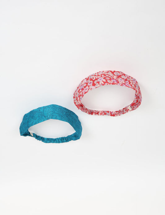 Upcycled sari elastic headband in colorful recycled fabric, handmade with zero waste clothing practices—an example of ethical clothing, fair trade fashion, and eco friendly fashion supporting climate neutral, sustainable women’s clothing.