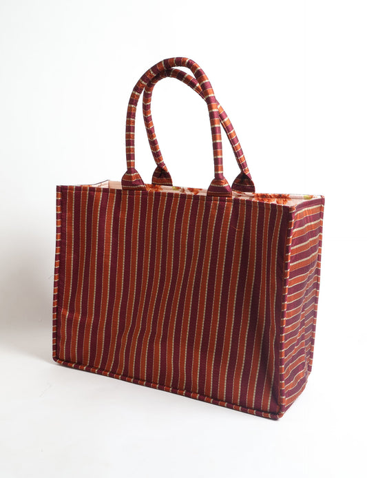 Elevate your eco-friendly style with our Work Tote Bag, a semi-structured, sustainable masterpiece. Soft padded handles, contrast lining, and an inside zipper pocket make it both stylish and functional. Perfect for carrying your laptop and more, this tote stands tall as a symbol of conscious fashion.