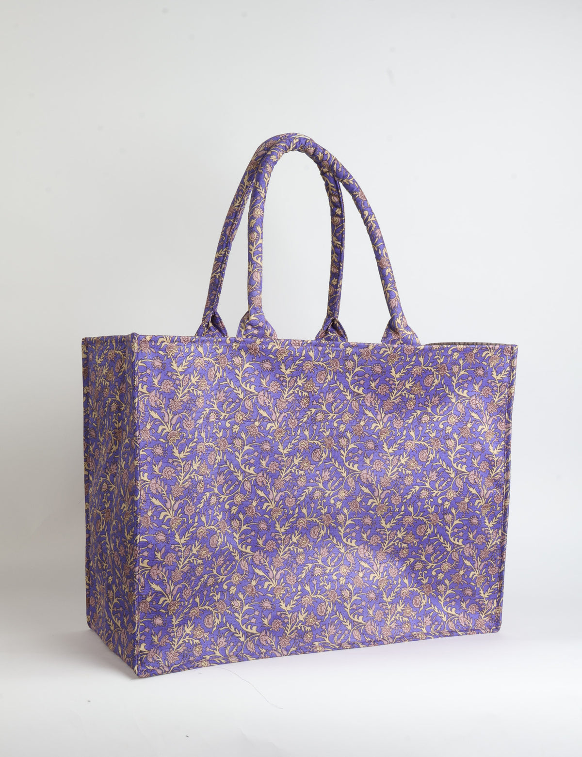 Grey floral patterned work tote bag with padded handles, front view, standing upright on white background