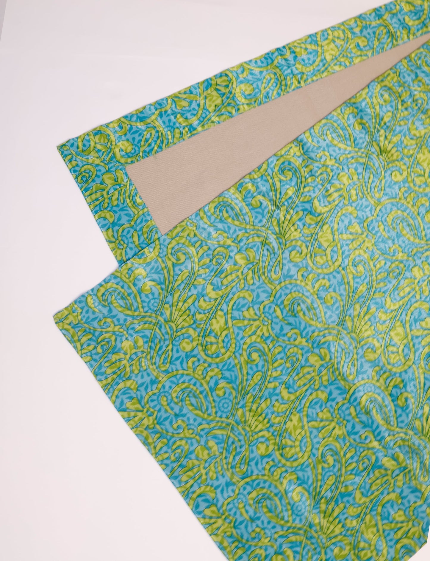 Crafted with care, our 160x40 cm reversible table runner is a blend of 100% cotton canvas and upcycled sari fabric. Ethical, green, and designed for sustainability, this piece adds a unique touch to your dining setup, sparking conversations about eco-friendly living.