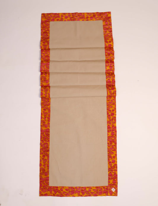 Crafted with care, our 160x40 cm reversible table runner is a blend of 100% cotton canvas and upcycled sari fabric. Ethical, green, and designed for sustainability, this piece adds a unique touch to your dining setup, sparking conversations about eco-friendly living.