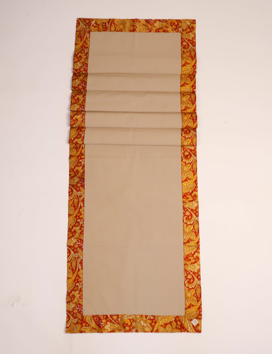 Crafted with care, our 160x40 cm reversible table runner is a blend of 100% cotton canvas and upcycled sari fabric. Ethical, green, and designed for sustainability, this piece adds a unique touch to your dining setup, sparking conversations about eco-friendly living.