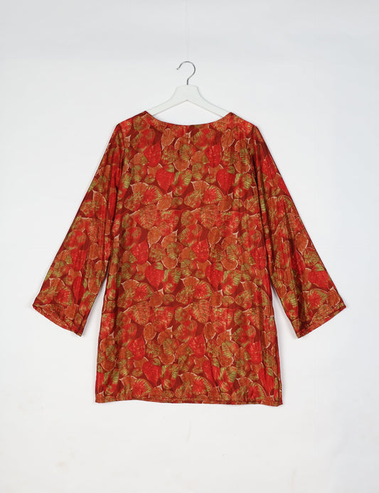 Chic and conscious, our A-line mini swing dress is a must-have in sustainable fashion. Adorned with flared sleeves, a keyhole back opening, and a mother of pearl button with twill tape loop. This zero waste, upcycled garment reflects the essence of eco-friendly and ethical clothing.