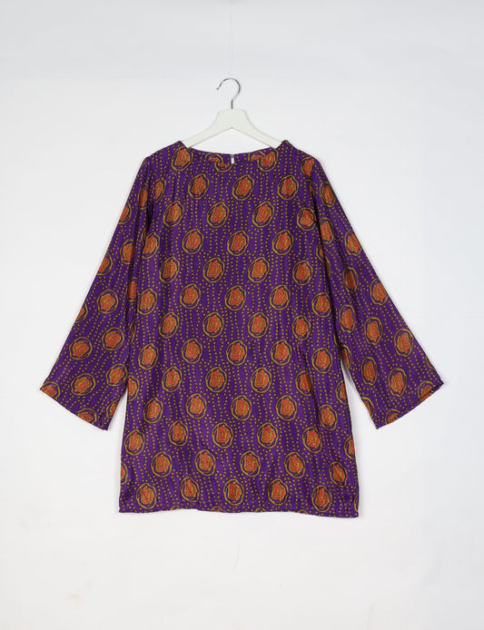 Chic and conscious, our A-line mini swing dress is a must-have in sustainable fashion. Adorned with flared sleeves, a keyhole back opening, and a mother of pearl button with twill tape loop. This zero waste, upcycled garment reflects the essence of eco-friendly and ethical clothing.