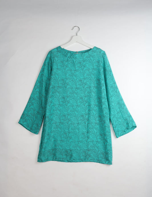 Chic and conscious, our A-line mini swing dress is a must-have in sustainable fashion. Adorned with flared sleeves, a keyhole back opening, and a mother of pearl button with twill tape loop. This zero waste, upcycled garment reflects the essence of eco-friendly and ethical clothing.