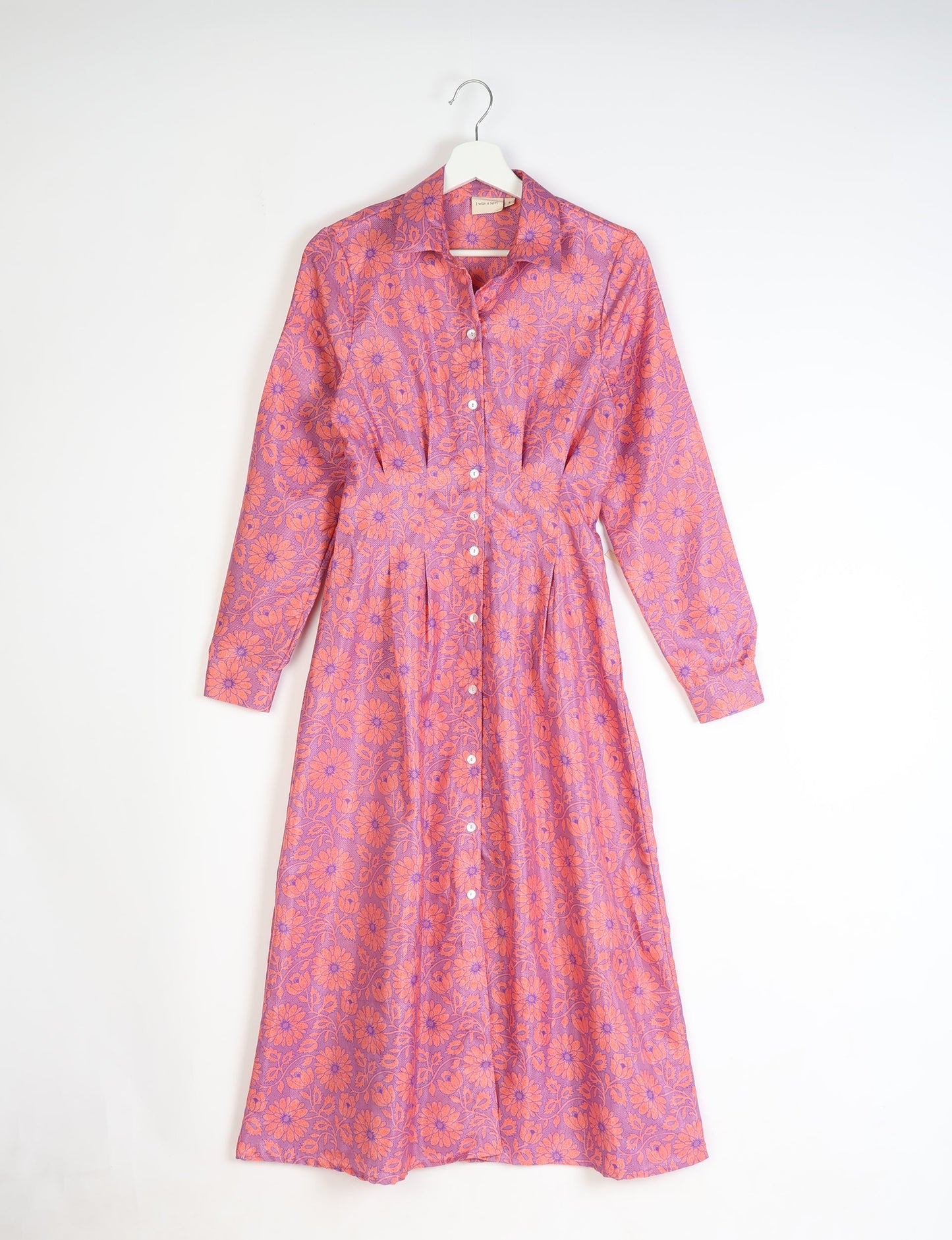 Midi shirt dress with cinched waist, crafted from recycled fabric. A sustainable women's clothing piece representing ethical fashion, eco-friendly products, and upcycled women's clothing.